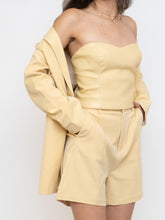 Load image into Gallery viewer, Babaton Pale Yellow Faux Leather Tube Top (