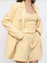 Load image into Gallery viewer, Babaton Pale Yellow Faux Leather Tube Top (