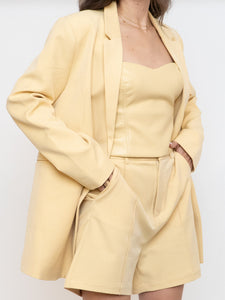 Babaton Pale Yellow Faux Leather Tube Top (