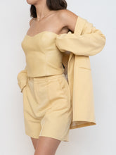 Load image into Gallery viewer, Babaton Pale Yellow Faux Leather Tube Top (