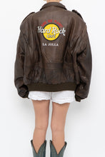Load image into Gallery viewer, Vintage x Made in Korea x Deadstock HARD ROCK HOTEL Brown Leather Bomber (S-L)